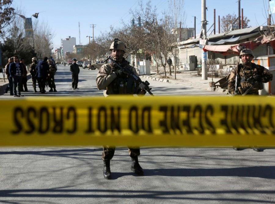Afghan security forces keep watch at the site of a suicide attack in Kabul, Afghanistan December 28, 2017. Islamic State said in an online statement that it was responsible for the attack, the latest in a series the movement has claimed on Shi'ite targets in Kabul, saying the centre received support from Iran. Suicide attack,Shi'ite center,Shi'ite Suicide attack,Afghan capital,Suicide bombers