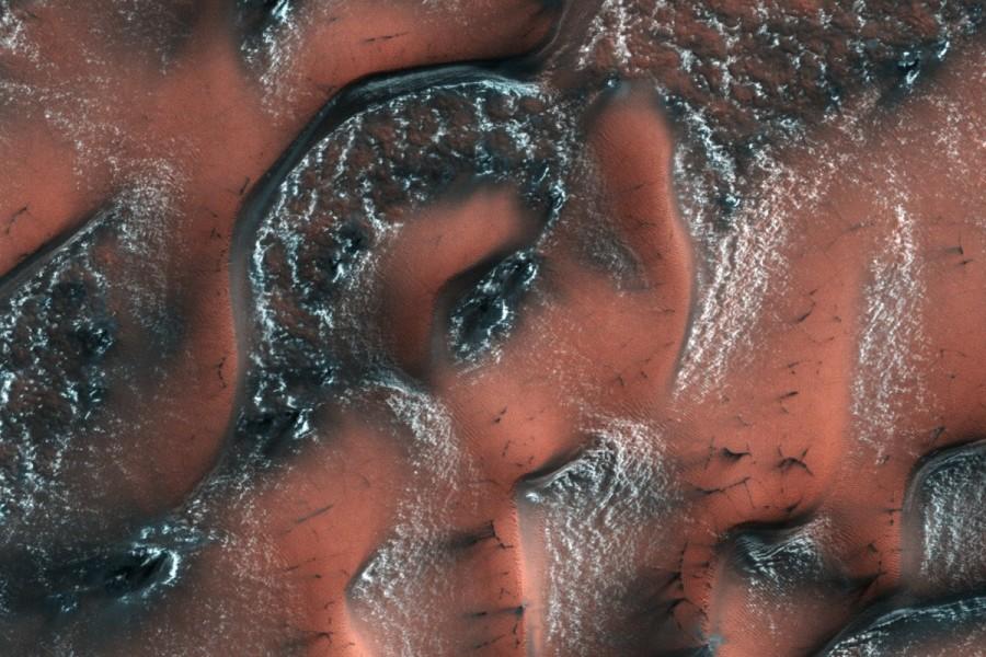 An image taken by the High Resolution Imaging Science Experiment (HiRISE) camera on NASA's Mars Reconnaissance Orbiter shows spring in the Northern hemisphere, with snow made of carbon dioxide, or dry ice, covering dunes. Best space images of 2017,Best space pics of 2017,Best space stills of 2017,Best space photos of 2017,astronomy images of 2017,astronomy pics of 2017,astronomy stills of 2017