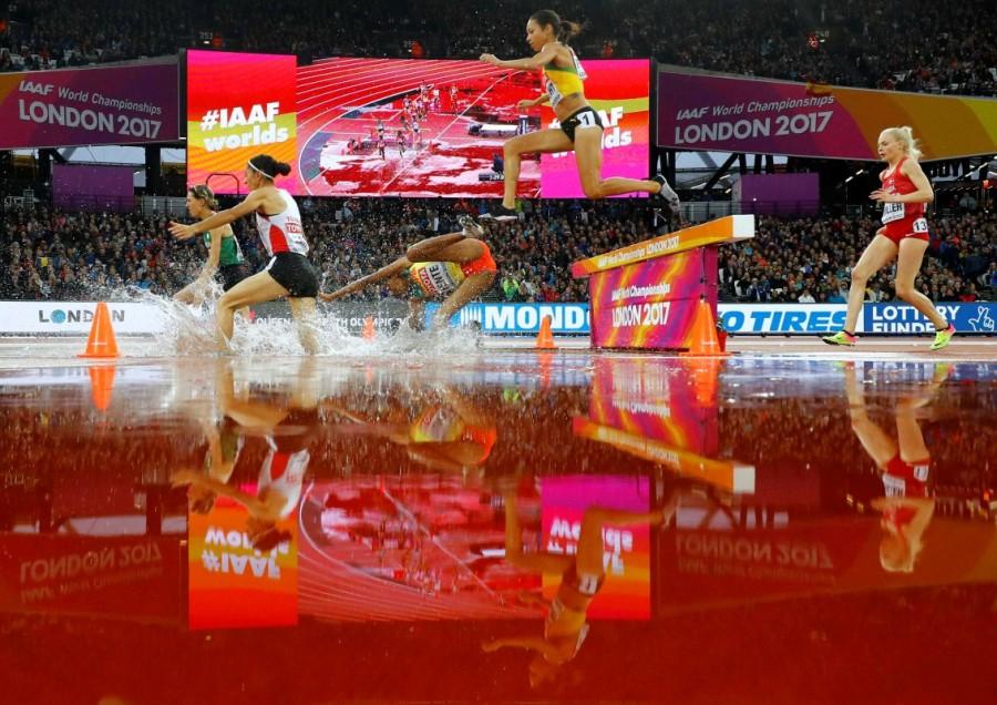 Athletics - World Athletics Championships - Women's 3000 Metres Steeplechase Heats - London Stadium, London, Britain – August 9, 2017. Birtukan Fente of Ethiopia falls during the heats. Great sports photos,sports photos of 2017,photos from around the world in 2017