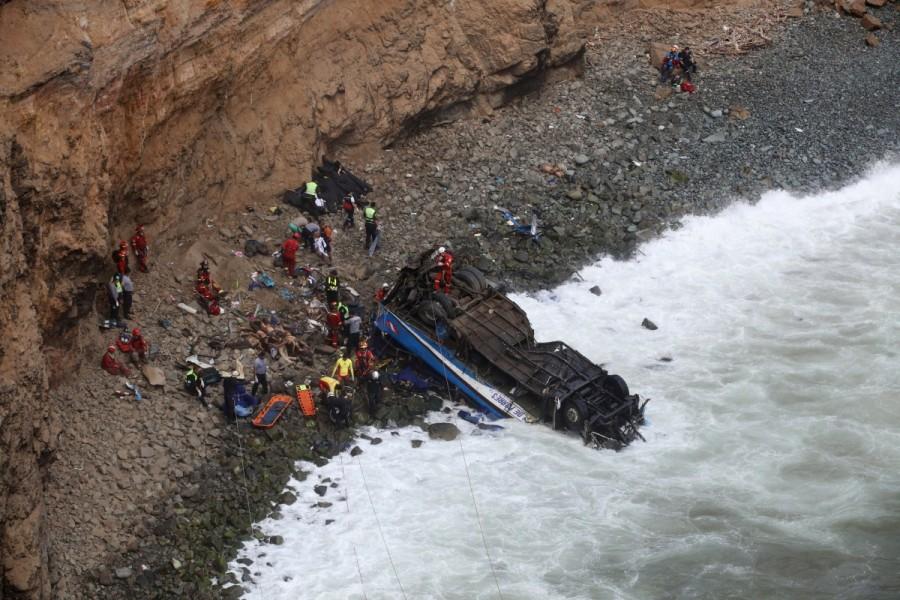 The accident occurred when the bus collided with a tractor-trailer and fell off the cliff. Peru bus accident,Peru accident,Peru accident kills 48,Peru bus accident kills 48