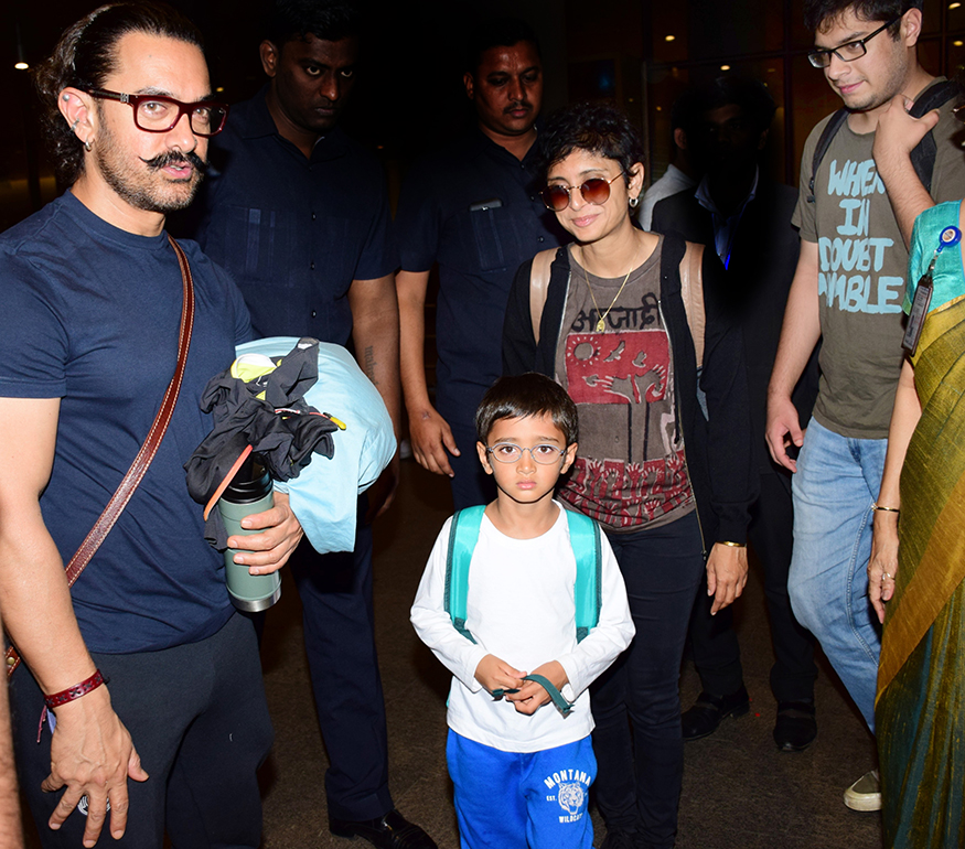 Aamir Khan snapped at the airport with his wife Kiran Rao and son Azad Rao Khan while returning to Mumbai after ringing 2018 in abroad. Aamir Khan,actor Aamir Khan,Azad Rao Khan,Kiran Rao,Aamir Khan returns to Mumbai,Aamir Khan returns to Mumbai after New Year celebrations,Aamir Khan New Year celebration,Junaid Khan