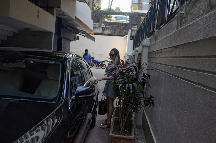 Bollywood actress Malaika Arora was spotted getting in her car outside the gym in Mumbai. Malaika Arora,Malaika Arora Khan,Malaika Arora spotted at gym,Malaika Arora at gym,Malaika Arora hits gym