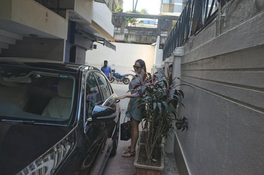 Malaika Arora poses for a photo as she leaves post her workout, in Mumbai. Malaika Arora,Malaika Arora Khan,Malaika Arora spotted at gym,Malaika Arora at gym,Malaika Arora hits gym