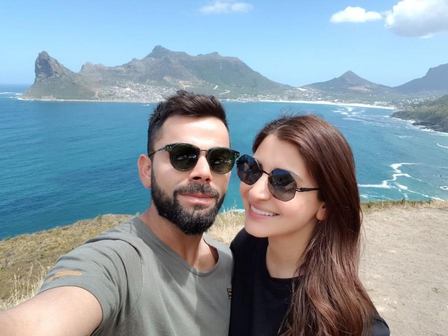 "Cape Town is such a beautiful place anyways, and even more beautiful with my one and only," Virat tweeted along with a selfie featuring the newly weds dressed casually and smiling away against the backdrop of sea. Anushka Sharma,Virat Kohli,Anushka Sharma and Virat Kohli,Anushka Sharma in Cape Town,Virat Kohli in Cape Town
