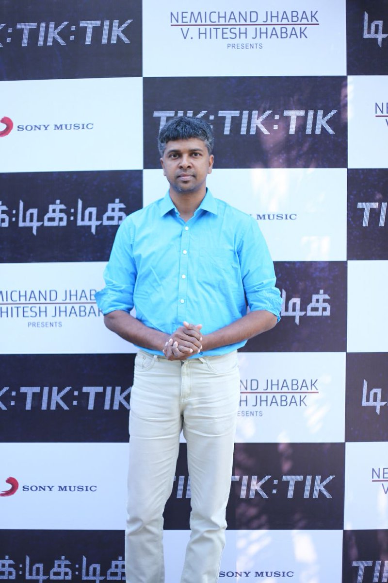 Lyricist Madhan Karky poses for the cameras during Tik Tik Tik audio launch. Jayam Ravi,D Imman,Nivetha Pethuraj,Tik Tik Tik,Tik Tik Tik audio launch,Tik Tik Tik audio,Tik Tik Tik music,Tik Tik Tik music launch,Tik Tik Tik audio launch pics,Tik Tik Tik audio launch images,Tik Tik Tik audio launch stills,Tik Tik Tik audio launch pi