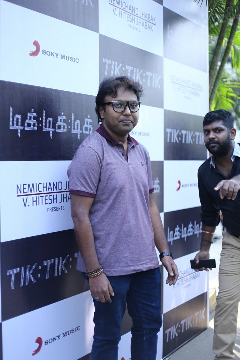 Music Director D Imman poses for the cameras during Tik Tik Tik audio launch. Jayam Ravi,D Imman,Nivetha Pethuraj,Tik Tik Tik,Tik Tik Tik audio launch,Tik Tik Tik audio,Tik Tik Tik music,Tik Tik Tik music launch,Tik Tik Tik audio launch pics,Tik Tik Tik audio launch images,Tik Tik Tik audio launch stills,Tik Tik Tik audio launch pi