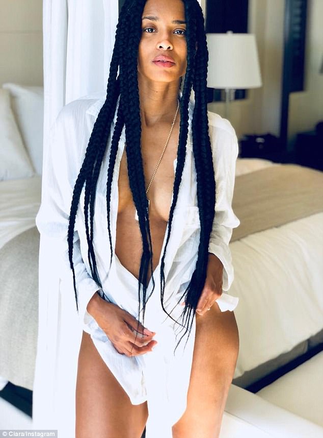 Ciara shares racy bedroom shots as she poses almost naked. Ciara,model Ciara,Ciara racy bedroom selfie,racy nude selfie,racy nude,racy hot selfie,Russell Wilson,Ciara unbuttons herself