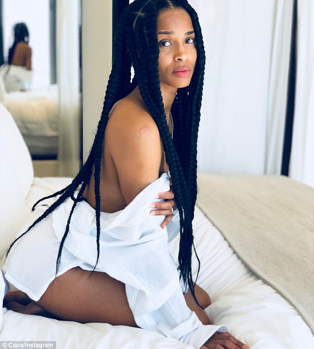 Singer Ciara shares racy bedroom pics. Ciara,model Ciara,Ciara racy bedroom selfie,racy nude selfie,racy nude,racy hot selfie,Russell Wilson,Ciara unbuttons herself