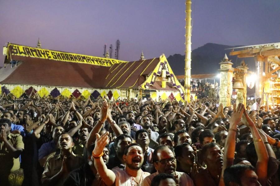 For the darshan one has to climb the 18 steps that leads to the sanctum santorum. It is here that a pilgrim has to wait for several hours, before climbing the steps to have the darshan. Lord Ayyappa darshan,Lord Ayyappa,Sabarimala temple,Sabarimala,Ayyappa darshan