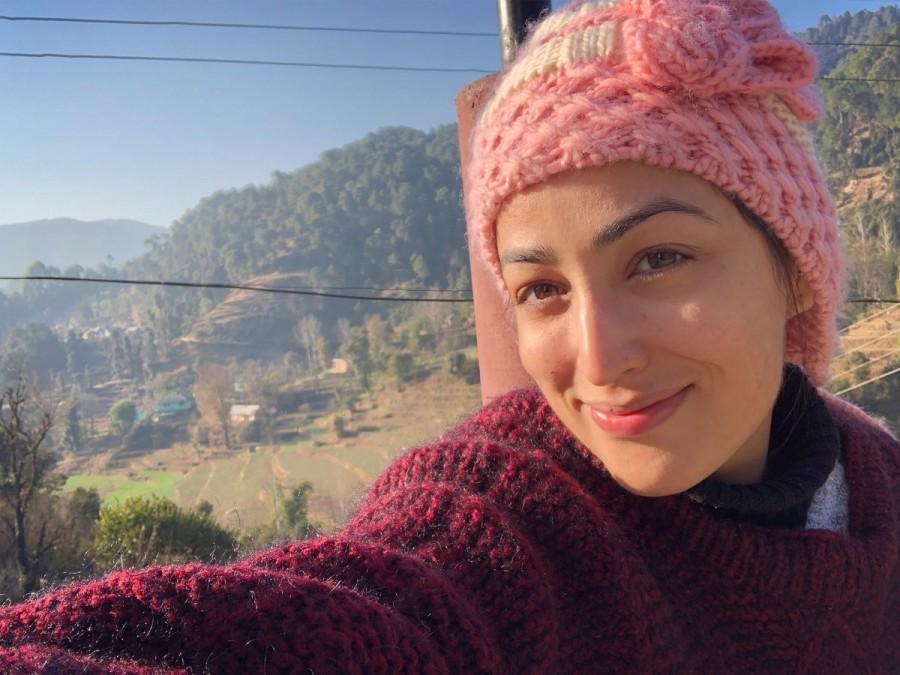 YG who hails from a Himachal Pradesh took time off and revisited her roots to bring in the new year. Seen striking a pose against a picturesque backdrop. Yami Gautam makes for a perfect picture. The picture posted by Yami on her social media page showcases the actress winter ready dressed in comfort woolens. The actress wrote, "Basking in the lap of Nature... #pahadigir" Yami Gautam,actress Yami Gautam,Yami Gautam at Himachal Pradesh,Hrithik Roshan,Kaabil