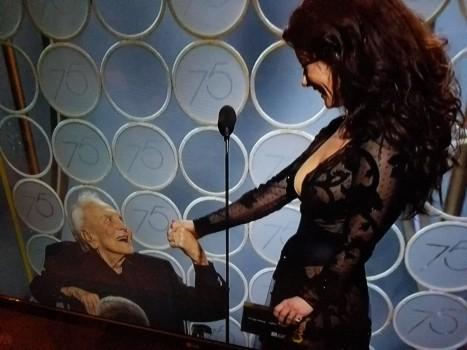 Before he came on the stage in his wheelchair, a montage of Douglas' career with highlights like scenes from 