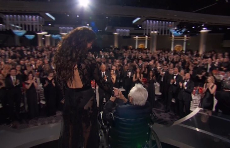 "In 1991, my father-in-law, this living Hollywood legend Kirk, was recognised by the Writers Guild of America for his role in ending the Hollywood blacklist. He not only hired black-listed screenwriter Dalton Trumbo to write the epic 'Spartacus', he insisted that Trumbo receive proper screen credit for his work," said Zeta-Jones, who is married to Douglas' son Michael. Kirk Douglas,actor Kirk Douglas,Kirk Douglas at Golden Globes,Golden Globes,Hollywood legend Kirk Douglas,Catherine Zeta-Jones