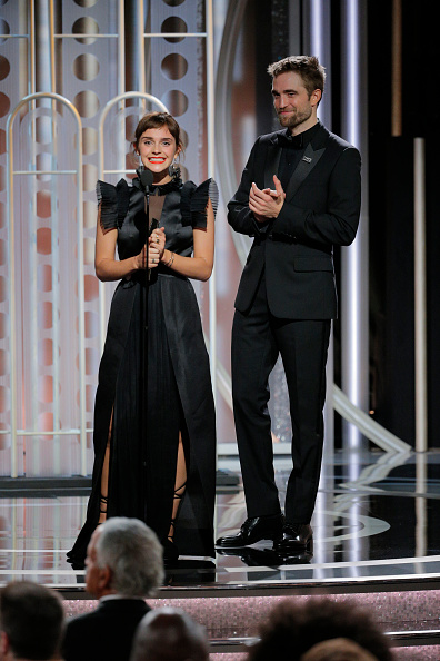 Emma Watson and Robert Pattinson speaks onstage during the 75th Annual Golden Globe Awards. Emma Watson and Robert Pattinson,Emma Watson,Robert Pattinson,Harry Potter reunion,Harry Potter,Golden Globes 2018