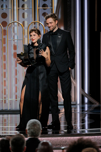 Presenters Emma Watson and Robert Pattinson speaks onstage during the 75th Annual Golden Globe Awards at The Beverly Hilton Hotel on January 7, 2018. Emma Watson and Robert Pattinson,Emma Watson,Robert Pattinson,Harry Potter reunion,Harry Potter,Golden Globes 2018