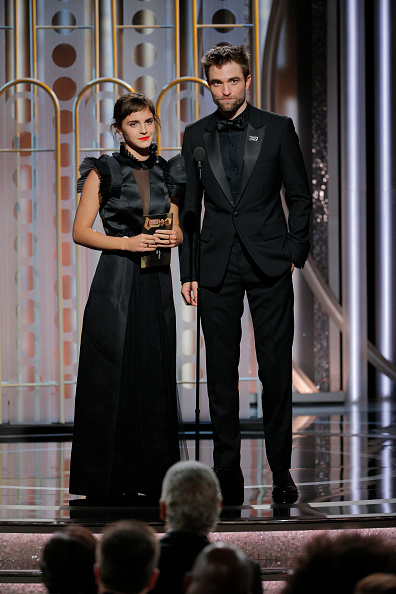 Presenters Emma Watson and Robert Pattinson speaks onstage during the 75th Annual Golden Globe Awards at The Beverly Hilton Hotel on January 7, 2018 in Beverly Hills, California. Emma Watson and Robert Pattinson,Emma Watson,Robert Pattinson,Harry Potter reunion,Harry Potter,Golden Globes 2018