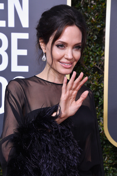 Actor Angelina Jolie attends The 75th Annual Golden Globe Awards at The Beverly Hilton Hotel on January 7, 2018 in Beverly Hills, California. Angelina Jolie,Angelina Jolie son,Angelina Jolie son Maddox,Maddox,Angelina Jolie at Golden Globes 2018,Golden Globes 2018,celebs at Golden Globes 2018