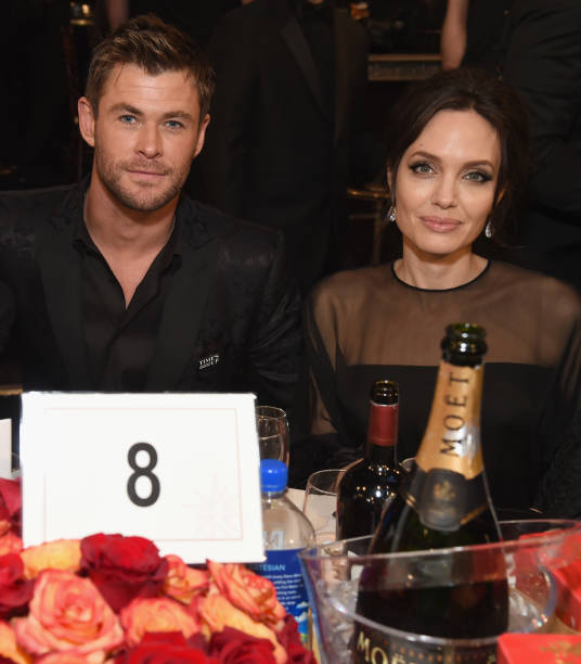 Actor Chris Hemsworth (L) and actor/filmmaker Angelina Jolie celebrate The 75th Annual Golden Globe Awards with Moet & Chandon at The Beverly Hilton Hotel on January 7, 2018 in Beverly Hills, California. Angelina Jolie,Angelina Jolie son,Angelina Jolie son Maddox,Maddox,Angelina Jolie at Golden Globes 2018,Golden Globes 2018,celebs at Golden Globes 2018