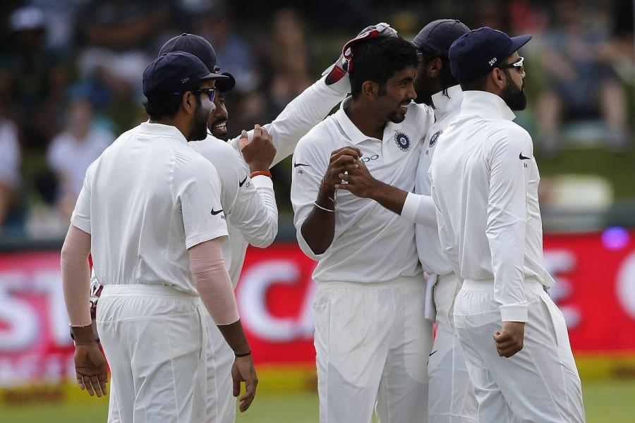 The tone was set by Bhuvneshwar Kumar (2/33) and Shami early on before Bumrah came into his own. Wickets kept falling as the Indian seamers continued their dominance on the fourth morning. India need 208 runs,Ind vs SA 1st Test,India vs South Africa,India vs South Africa 2018,India vs South Africa 1st Test,India vs South Africa Tests,india vs south africa live