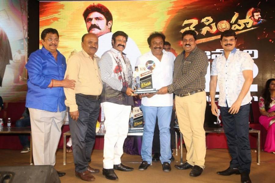 Telugu movie Jai Simha pre-release event held in Hyderabad. Celebs like Nandamuri Balakrishna, Natasha Doshi, Brahmanandam, VV Vinayak, Boyapati Srinu, KS Ravi Kumar graced the event. Nandamuri Balakrishna,Natasha Doshi,Brahmanandam,VV Vinayak,Boyapati Srinu,KS Ravi Kumar,Jai Simha pre-release event,Jai Simha review,Jai Simha movie review,Jai Simha pre-release pics,Jai Simha pre-release images,Jai Simha pre-release stills,Jai Simha pre
