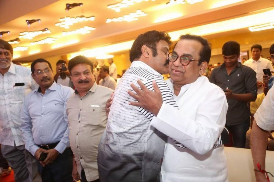 Nandamuri Balakrishna and Brahmanandam Khan greet each other at Jai Simha pre-release event. Nandamuri Balakrishna,Natasha Doshi,Brahmanandam,VV Vinayak,Boyapati Srinu,KS Ravi Kumar,Jai Simha pre-release event,Jai Simha review,Jai Simha movie review,Jai Simha pre-release pics,Jai Simha pre-release images,Jai Simha pre-release stills,Jai Simha pre
