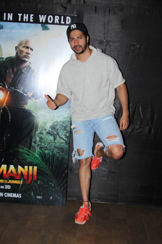 Varun Dhavan poses for a photo at the special screening of Jumanji at Lightbox. Varun Dhavan,Kartik Aryan,Jumanji,Jumanji special screening,Jumanji: Welcome to the Jungle,Jumanji special screening pics,Jumanji special screening images,Jumanji special screening stills,Jumanji special screening pictures,Jumanji special screening photos