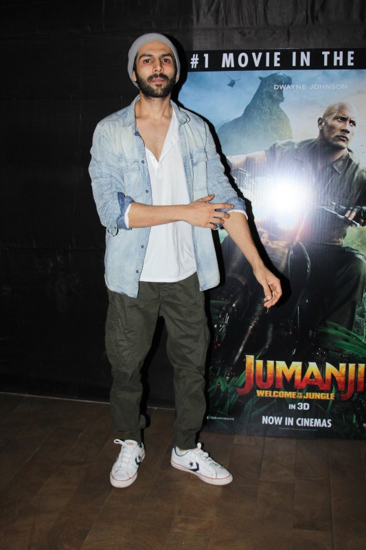 Kartik Aryan poses for a photo at the special screening of Jumanji at Lightbox. Varun Dhavan,Kartik Aryan,Jumanji,Jumanji special screening,Jumanji: Welcome to the Jungle,Jumanji special screening pics,Jumanji special screening images,Jumanji special screening stills,Jumanji special screening pictures,Jumanji special screening photos