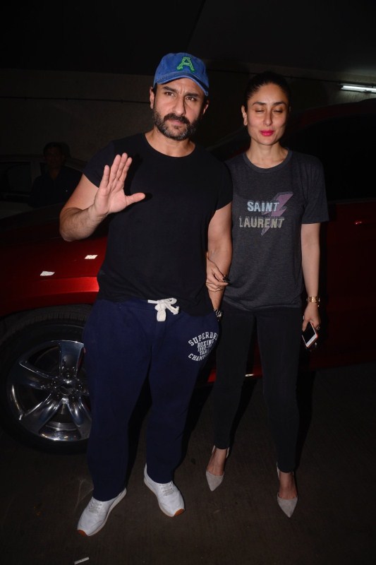 Star couple Saif Ali Khan and Kareena Kapoor Kha pose together at the special screening of Kaalakaandi at Lightbox in Mumbai. Saif Ali Khan,Kareena Kapoor,Saif Ali Khan and Kareena Kapoor,Kareena Kapoor Khan,Kaalakaandi,Kaalakaandi special screening,Kaalakaandi special screening pics,Kaalakaandi special screening images,Kaalakaandi special screening stills,Kaalakaandi special sc