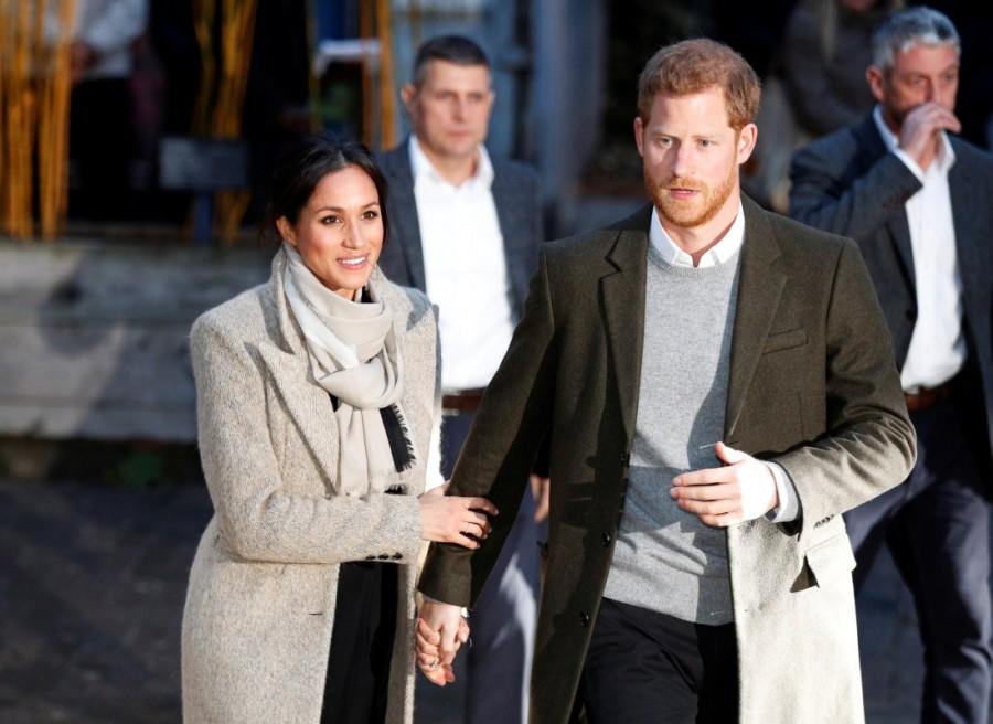Britain's Prince Harry and his fiancee Meghan Markle leave after visiting radio station Reprezent FM, in Brixton, London. Meghan Markle and Prince Harry,Meghan Markle,Prince Harry,Prince Harry visit radio station,Meghan Markle visit radio station