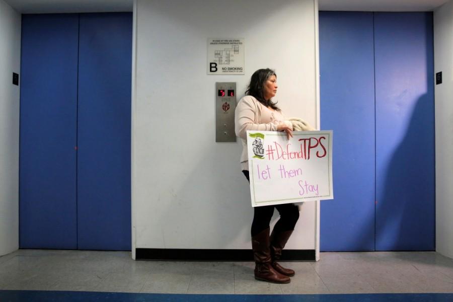 Salvadoran immigrant Mirna Portillo waits for an elevator after a news conference at the New York Immigration Coalition following President Trump's announcement to end the Temporary Protection Status for Salvadoran immigrants, in Manhattan. Salvadoran immigrants,U.S. protest,United States,Trump administration