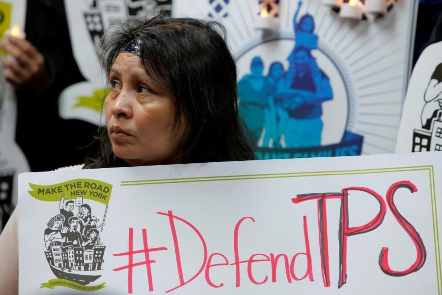 Salvadoran immigrant Mirna Portillo watches during a media conference at the New York Immigration Coalition in Manhattan. Salvadoran immigrants,U.S. protest,United States,Trump administration