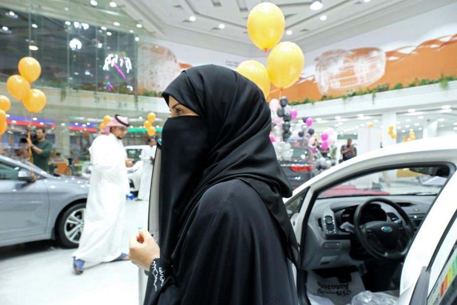 A Saudi woman is seen at the first automotive showroom solely dedicated for women in Jeddah, Saudi Arabia January 11, 2018. Saudi Arabia,women in Jeddah,car showroom,women car showroom,Saudi Arabia women car showroom,women car showroom in Saudi Arabia,Jeddah