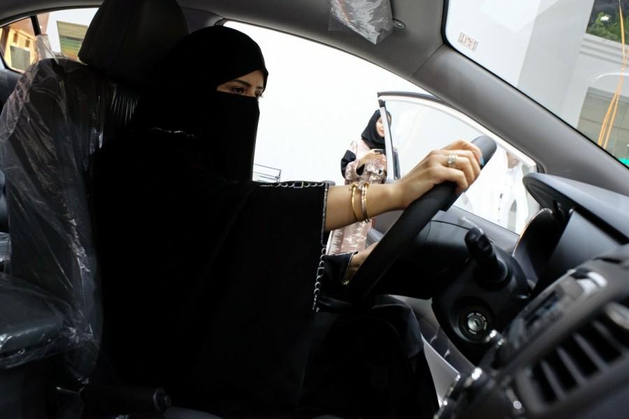 A Saudi woman checks a car at the first automotive showroom solely dedicated for women in Jeddah, Saudi Arabia January 11, 2018. Saudi Arabia,women in Jeddah,car showroom,women car showroom,Saudi Arabia women car showroom,women car showroom in Saudi Arabia,Jeddah