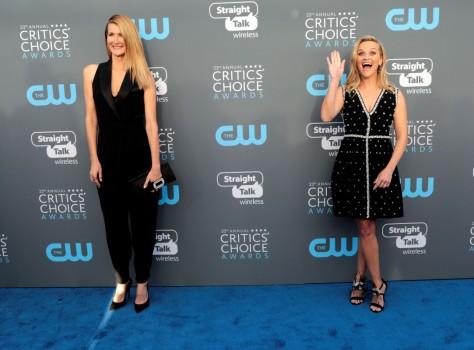 Laura Dern and Reese Witherspoon pose together as they arrive at Critics choice red carpet.