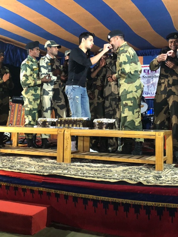 Overwhelmed by the celebrations actor Sidharth Malhotra said to the army officials, "I feel very special, thank you so much for entertaining us so well and celebrating my birthday. Thank you, Ajay and Amit sir (Army officers), when we did activities throughout the day with you, we realized how hard you work for our security. We just wanted to spend a day with you, some recreation, singing, dancing, this is all that we can give you back because what you all do for us is too high in value, what we are doing for you is too less. I'm hoping that you continue to protect us and we come back to entertain you. Thank you so much for making it special." Team Aiyaary,Aiyaary,Aiyaary team,Neeraj Pandey,Manoj Bajpayee,Sidharth Malhotra,Rakul Preet Singh,Pooja Chopra,Sidharth Malhotra birthday