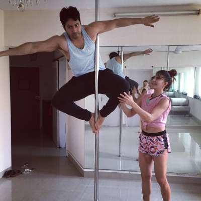 Varun Dhawan, who seems to have gone fond of the fitness form, took to his social media few days back to share an image of himself on a pole, with Jacqueline mentoring him. Jacqueline Fernandez,actress Jacqueline Fernandez,Jacqueline Fernandez pole dance,Jacqueline Fernandez pole dance pics,Jacqueline Fernandez pole dance images,Jacqueline Fernandez pole dance stills,Jacqueline Fernandez pole dance pictures
