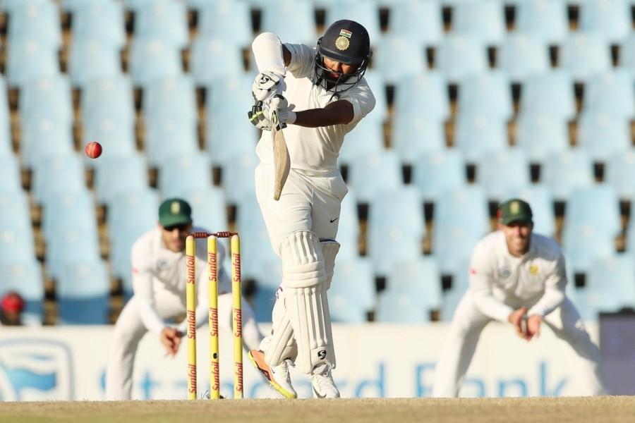 The debutant struck immediately to pack back Ravichandran Ashwin (3), caught behind before Shami arrived to forge a 54-run eighth wicket stand with Rohit. Despite his partners departing one by one at the other end, the 30-year-old Rohit continued playing his natural game, defending the good balls and taking the left-arm spinner Keshav Maharaj to the cleaners, before falling short by three runs for his 10th Test half century. South Africa beat India,South Africa crash India,india vs south africa,Lungi Ngidi,S. Africa outsmart India,Virat Kohli