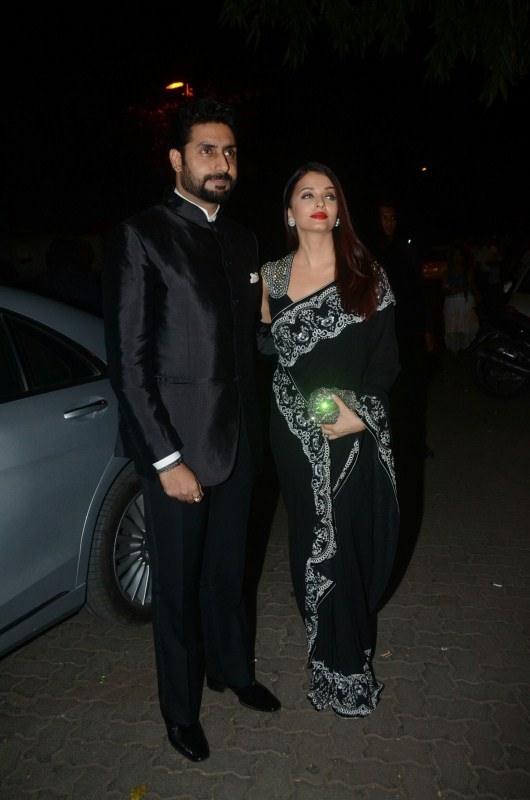 Celebrity couple Abhishek Bachchan and Aishwarya Rai Bachchan pose together as they arrive at Mickey Contractor's MAC party in Mumbai. Abhishek Bachchan,Aishwarya Rai,Kajol,Shilpa Shetty,Sushmita Sen,Mickey Contractor's MAC Party,Mickey Contractor's MAC Party pics,Mickey Contractor's MAC Party images,Mickey Contractor's MAC Party stills,Mickey Contractor's MAC Pa