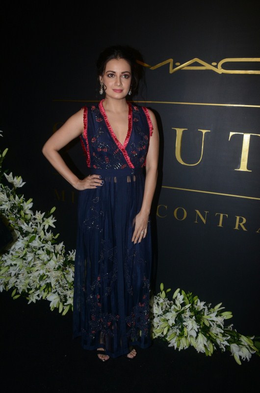 Dia Mirza poses for photographers on her arrival at Mickey Contractor's MAC party in Mumbai. Karan Johar,Jaya Bhaduri Bachchan,Madhuri Dixit,Dia Mirza,Mickey Contractor's MAC Party,Mickey Contractor's MAC Party pics,Mickey Contractor's MAC Party images,Mickey Contractor's MAC Party stills,Mickey Contractor's MAC Party pic
