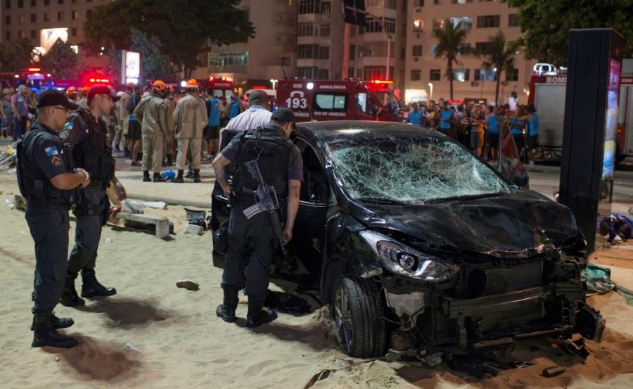A vehicle that ran over some people at Copacabana beach is seen in Rio de Janeiro, Brazil January 18, 2018. Car plows,crowded sidewalk,Copacabana beach,Driver ploughs,Rio de Janeiro car incident,Rio de Janeiro,Car plows into crowd