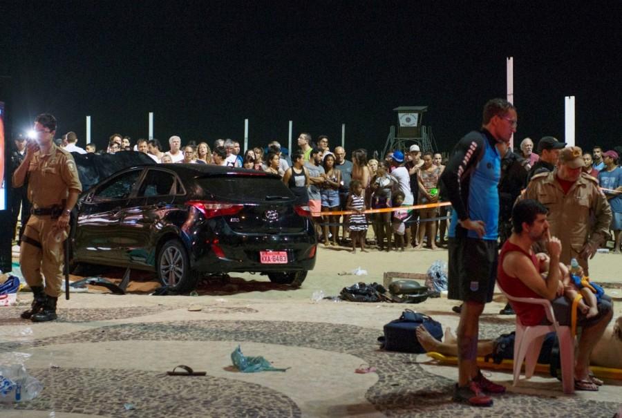 A vehicle that ran over some people at Copacabana beach is seen in Rio de Janeiro, Brazil January 18, 2018. Car plows,crowded sidewalk,Copacabana beach,Driver ploughs,Rio de Janeiro car incident,Rio de Janeiro,Car plows into crowd