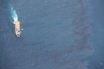 A Chinese rescue ship works to clean oil slicks from the sunken Iranian oil tanker Sanchi in the East China Sea, in this January 15, 2018 handout picture released by China's Ministry of Transport January 17, 2018.