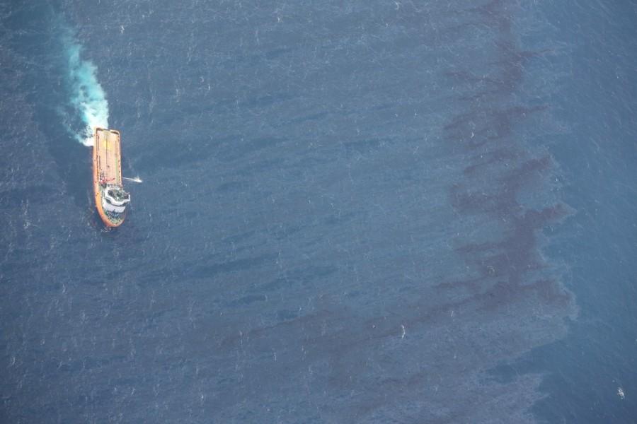 A Chinese rescue ship works to clean oil slicks from the sunken Iranian oil tanker Sanchi in the East China Sea, in this January 15, 2018 handout picture released by China's Ministry of Transport January 17, 2018. Oil spill,Oil spill in China,Oil spill in China sea,East China Sea