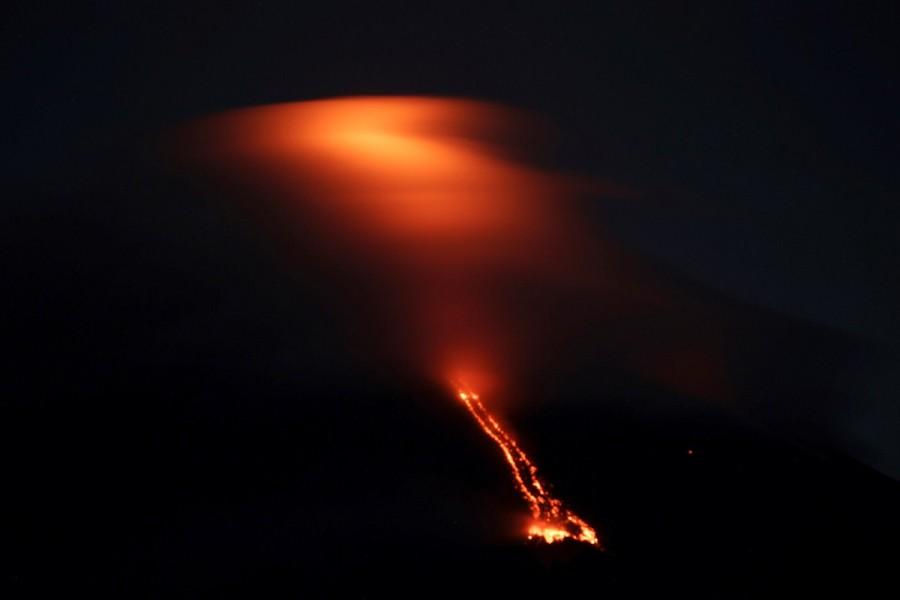 Reddish glow of lava drifting towards southwest part of Mayon volcano in Camalig town, Albay province, south of Manila, Philippines January 15, 2018. Volcano in Philippines,volcano,volcano eruption,Mayon volcano spews,Mayon volcano