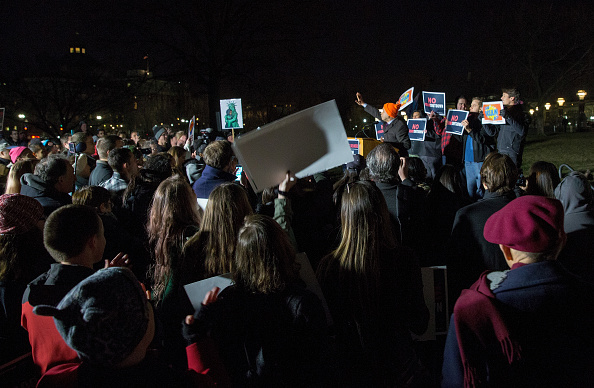 Senator Cory Booker (D-NJ) speaks at a rally outside the US Capital on January 19, 2018 in Washington, DC. A continuing resolution to fund the government has passed the House of Representatives but faces a stiff challenge in the Senate. US Government Shutdown,US Shutdown,Senate debates,Donald Trump,US President Donald Trump,US government,US Shutdown pics,US Shutdown images,US Shutdown stills,US Shutdown pictures,US Shutdown photos