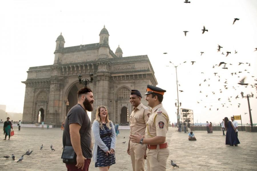 Policemen at Gateway of India interacting with foreign tourists: Smiles know no boundaries! Hosting goodwill for Mumbai is always our priority. For our ‘Athithis’ we strive to ensure that their stay is not only safe and secure but a cheerful one too. Amitabh Bachchan,actor Amitabh Bachchan,Mumbai Police 2018 Calendar,Mumbai Police Calendar,Amitabh Bachchan unveils Calendar,Mumbai Police
