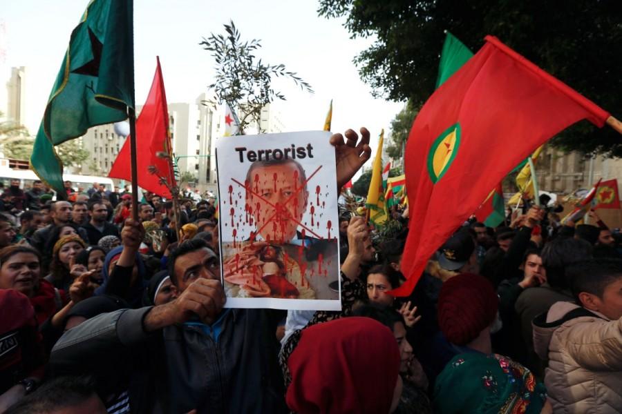 Kurdish protesters hold flags during a protest in front of the Russian embassy in Beirut, Lebanon January 22, 2018. Turkish,Turkish forces,Syria