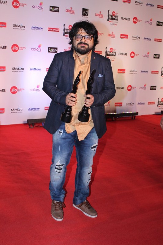Pritam poses for the cameras at 63rd Jio Filmfare Awards 2018 in Mumbai. Rajkumar Rao,Sonali Bendre,Ayushmann Khurrana,Rajkummar Rao,63rd Jio Filmfare Awards 2018,Jio Filmfare Awards 2018,Jio Filmfare Awards,Jio Filmfare Awards pics,Jio Filmfare Awards images,Jio Filmfare Awards stills,Jio Filmfare Awards pictures