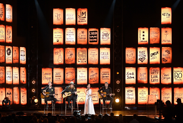 The backdrop was a montage of names of some of those who lost their lives in the attack. T.J. Osborne,John Osborne,Maren Morris,Eric Church,Tears in Heaven,60th Annual GRAMMY Awards,Grammys 2018,Grammys awards