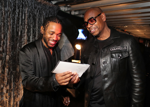 Star singer Kendrick Lamar gave a politically charged performance to kickstart the 60th Grammy Awards here, as he took the stage in front of an American flag and with men dressed in military uniform. Lamar, one of the leading nominees of the Grammys this year, performed "XXX", his collaboration with U2. He was joined by Bono and the Edge on stage on Sunday before comedian Dave Chappelle came in. Kendrick Lamar,singer Kendrick Lamar,Kendrick Lamar at Grammy,Grammy,Grammy Awards,60th Grammy Awards