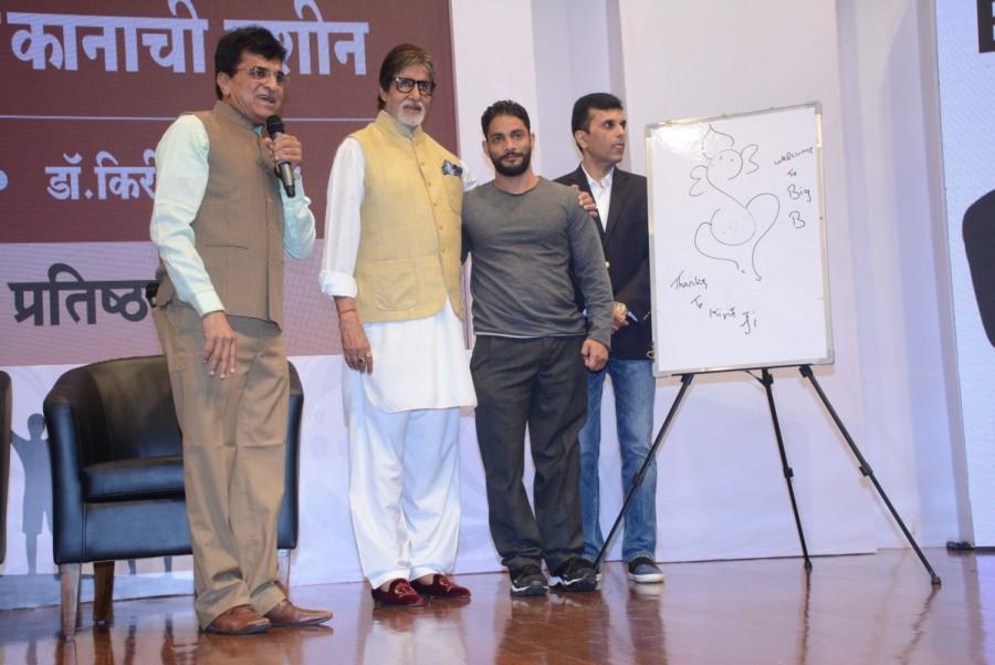 Organised by the Yuvak Pratishthan Trust (YPT) and well-known Hindi film producer Anand Pandit, the initiative attempted to provide hearing aids to those who can't afford them. Amitabh Bachchan,actor Amitabh Bachchan,Amitabh Bachchan interacts with beneficiaries kids